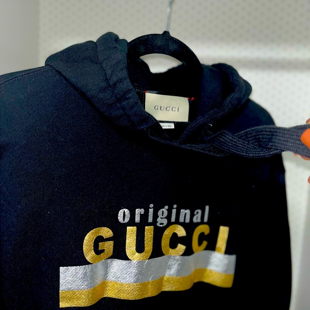 It’s a black sweater dress from Gucci worn once